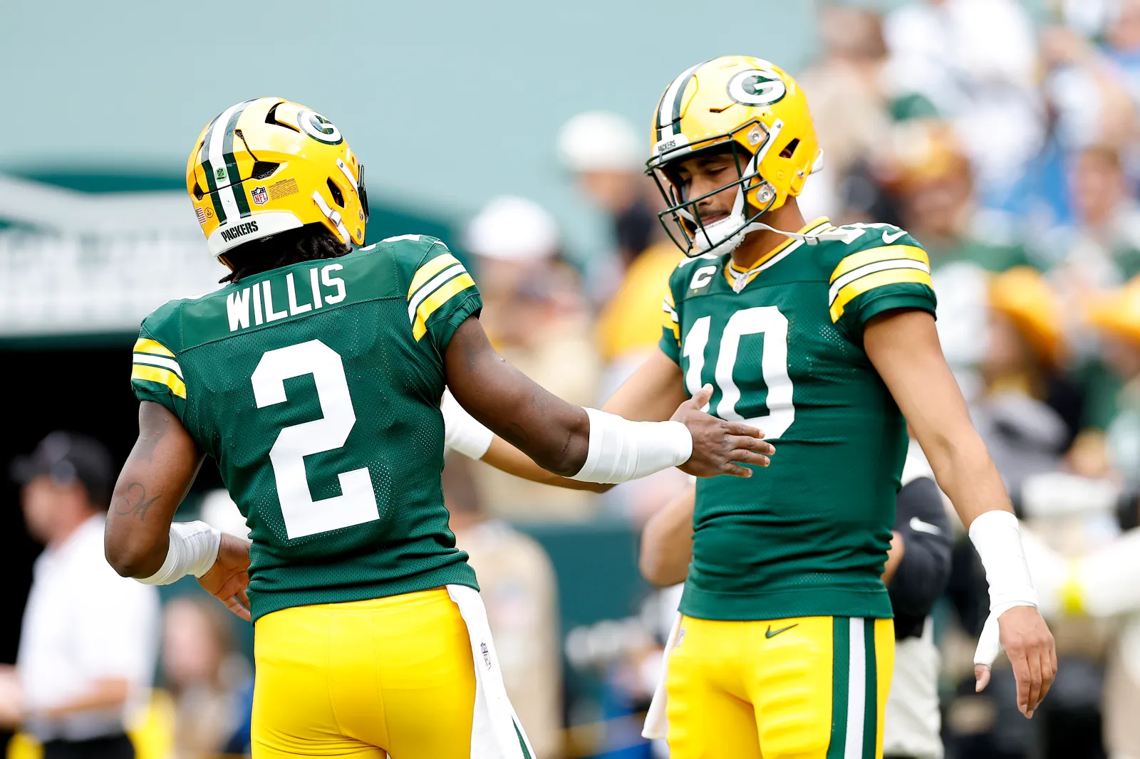 Green Bay Packers quarterbacks Jordan Love and Malik Willis