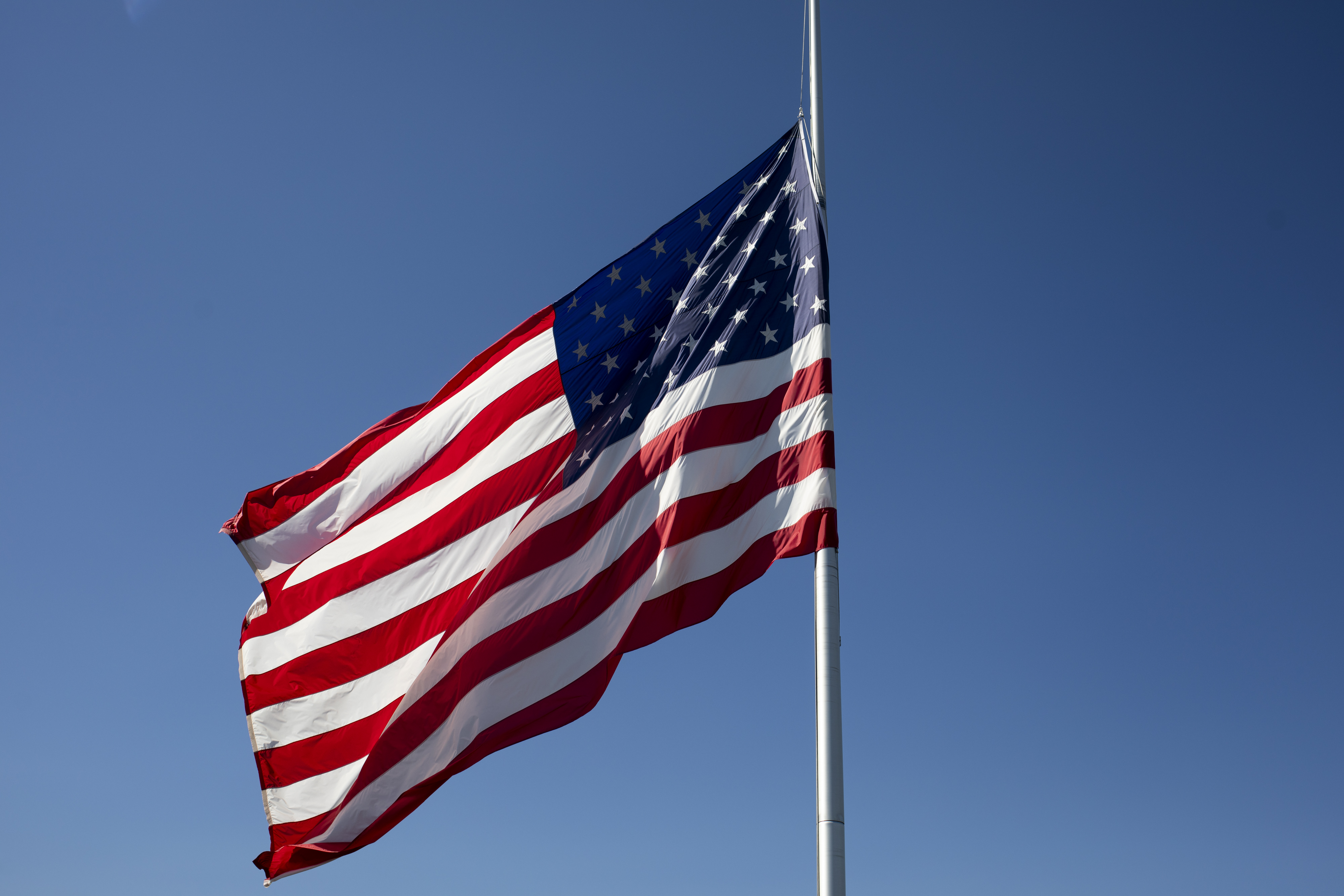 Why Flags Are Half-Staff in 3 States Today, This Weekend
