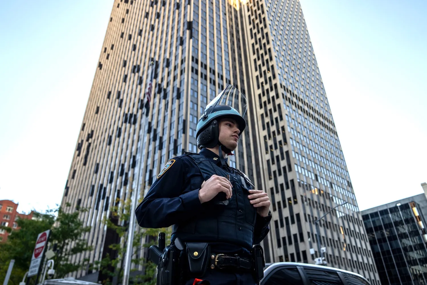 NYPD officers stand guard outside of 26 Federal Plaza in NYC on October 21, 2025. (Photo by Adam Gray/Getty Images)