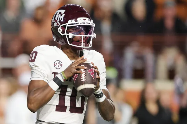 Marcel Reed #10 of the Texas A&M Aggies looks to pass during the first quarter against the Texas Longhorns