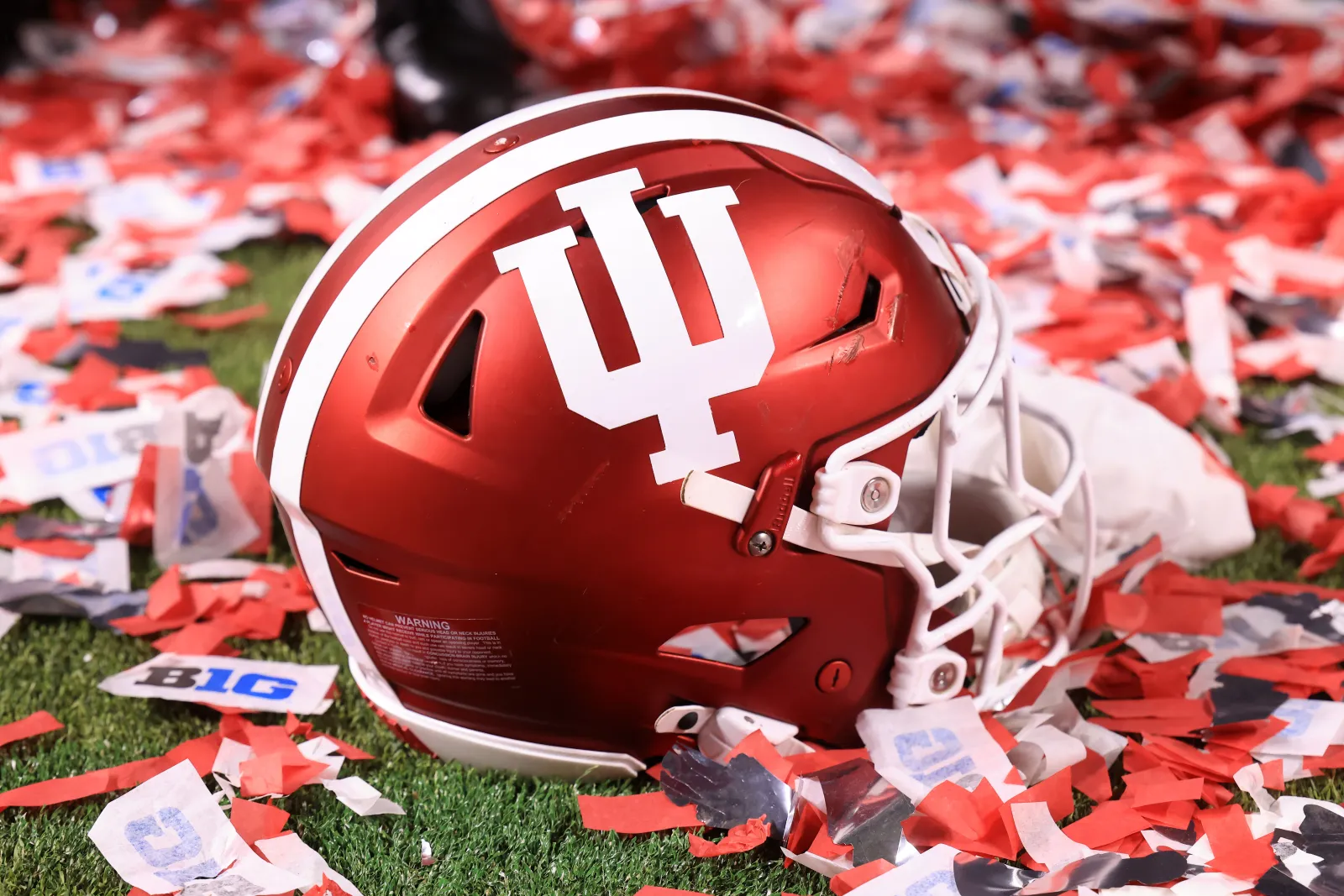 An Indiana Hoosiers helmet is seen on the field after the 2025 Big Ten Football Championship