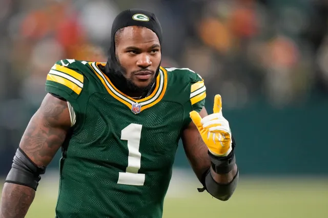 Micah Parsons #1 of the Green Bay Packers runs off field after a win over the Chicago Bears at Lambeau Field.