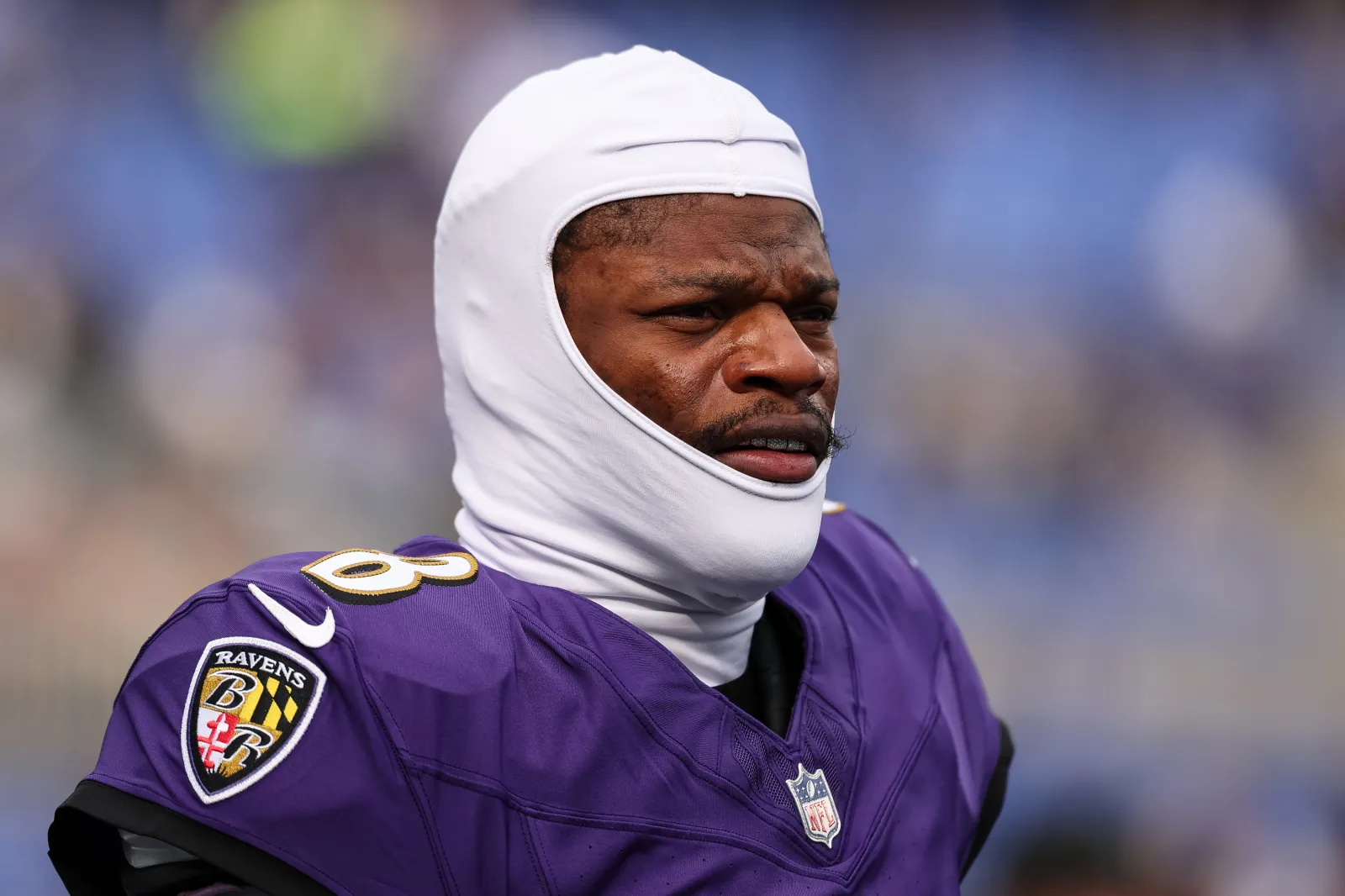 Lamar Jackson #8 of the Baltimore Ravens looks on before the game against the Pittsburgh Steelers at M&amp;T Bank Stadium on December 7, 2025 in Baltimore, Maryland.