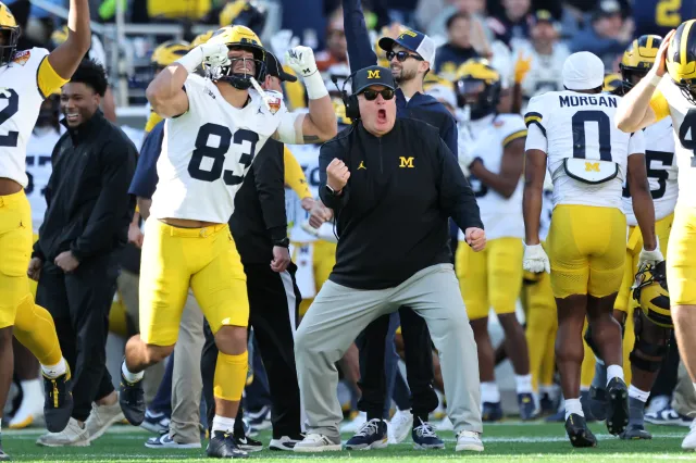 Biff Poggi interim head coach of Michigan Wolverines