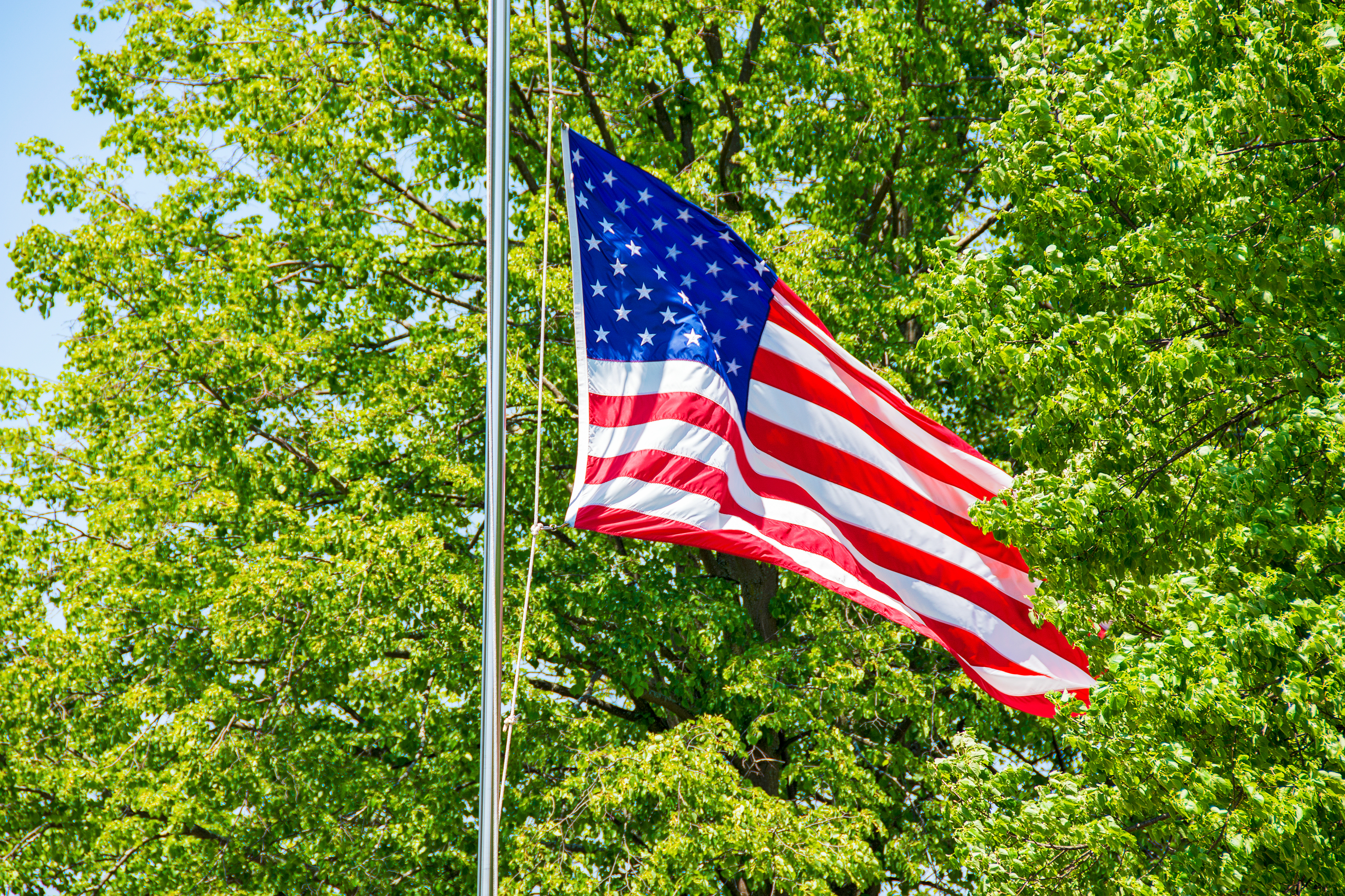 Why Flags Fly Half-Mast in Five States Today, This Weekend
