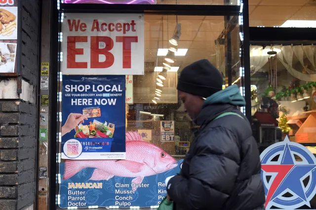 A store displays a sign accepting Electronic Benefits Transfer (EBT) cards for Supplemental Nutrition Assistance Program (SNAP) purchases for groceries, in the Brooklyn borough of New York City, NY, January 2, 2026.