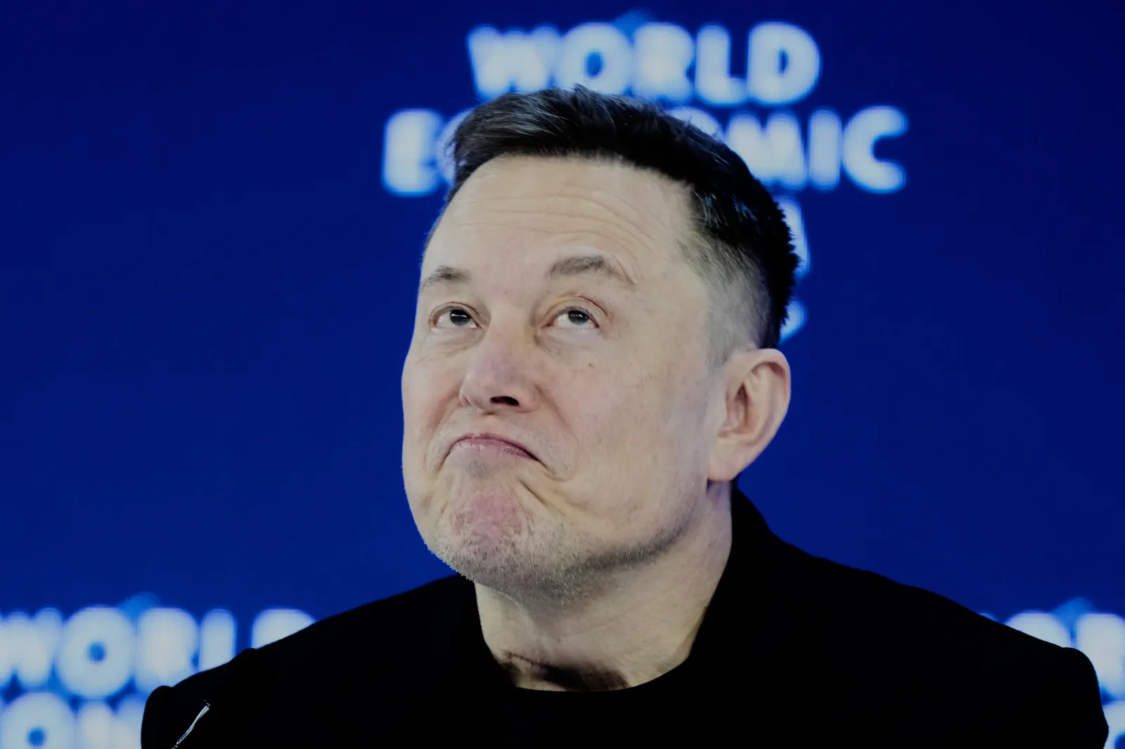 Elon Musk's Witty Jab at Trump's 'Board of Peace' Sparks Laughter at Davos