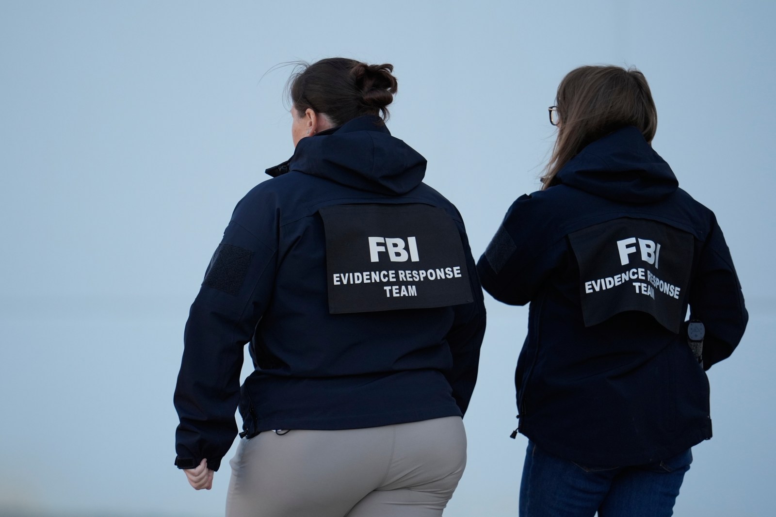 FBI officers are seen at the Fulton County Election Hub and Operation Center, Wednesday, January 28, 2026, in Union City, Georgia, near Atlanta. 

