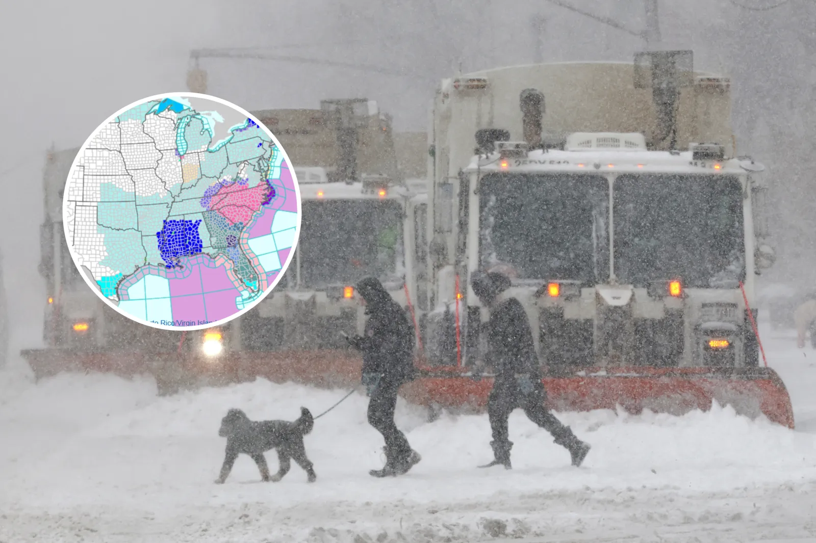 People cross a street as trucks plow snow in the Manhattan borough of New York City on January 25, 2026
