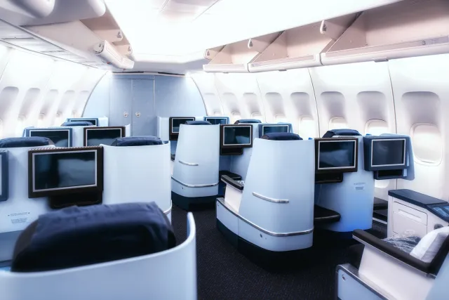 The interior of a business class cabin.