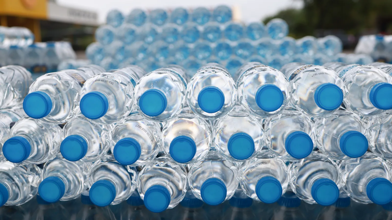 Stacks of bottled water.