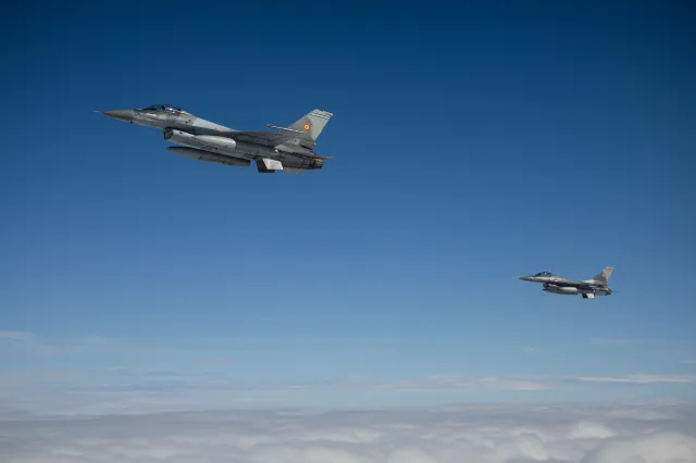 This photograph taken aboard a French Air Force Airbus A330 MRTT (Multi Role Tanker Transport), over Greek territorial waters, October 4, 2024 shows Romanian Air Force F-16 fighter jets waiting for an aerial refueling, while they participate in the "Ramstein Flag 2024" exercice.
