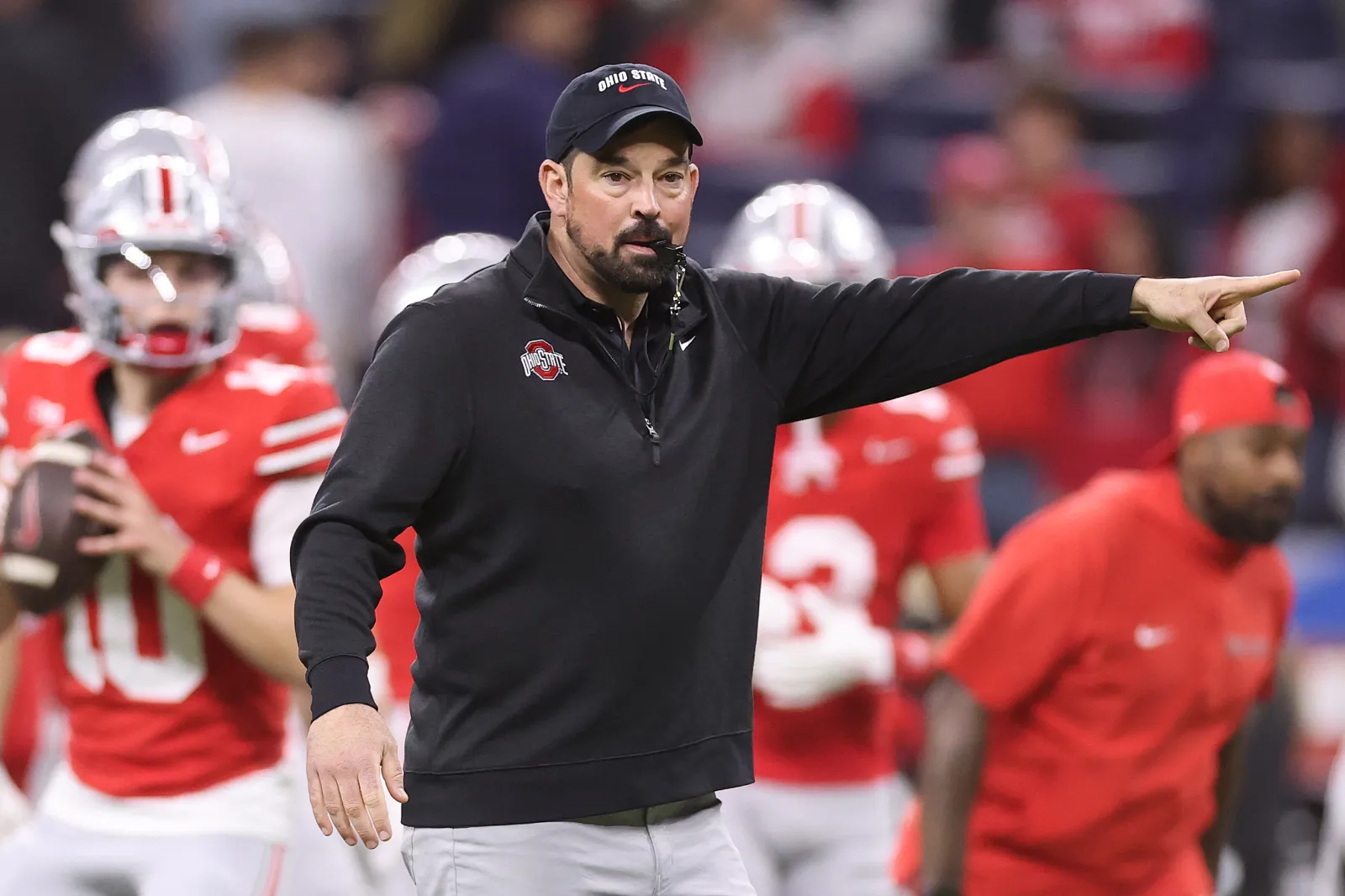 Head coach Ryan Day of the Ohio State Buckeyes looks on during warmups before the 2025 Big Ten Football Championship against the Indiana Hoosiers at Lucas Oil Stadium on December 06, 2025 in Indianapolis, Indiana.