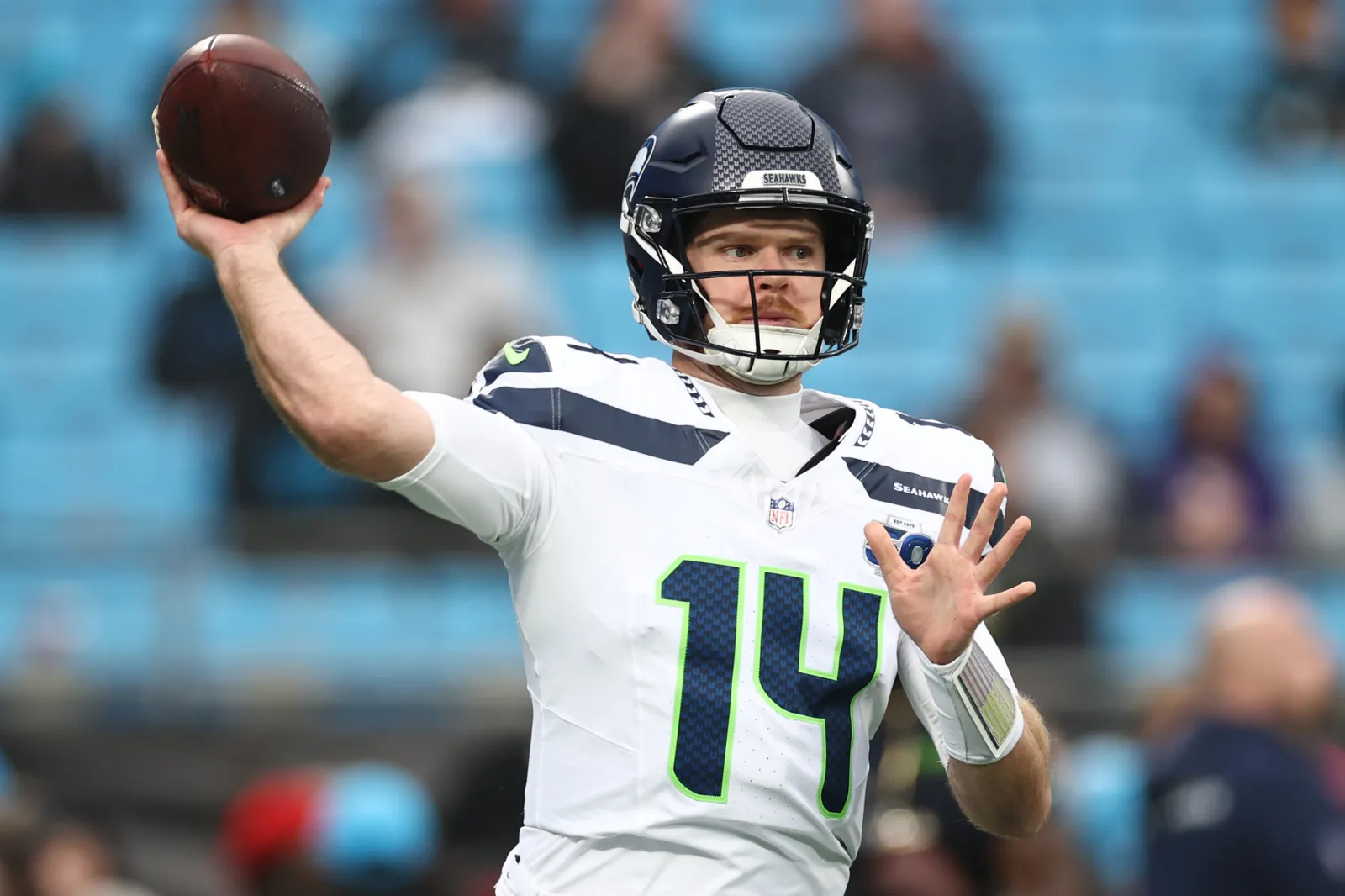 Sam Darnold #14 of the Seattle Seahawks warms up prior to a game against the Carolina Panthers at Bank of America Stadium on December 28, 2025 in Charlotte, North Carolina.