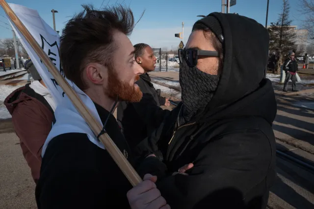 Pro-ICE and anti-ICE demonstrators face off during a protest outside of the Whipple federal building on January 09, 2026 in Minneapolis, Minnesota.