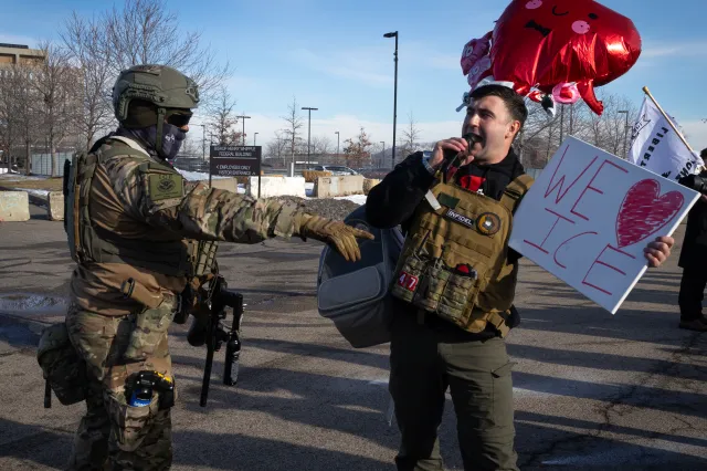 Jake Lane voices his support for ICE as he confronts anti-ICE demonstrators outside of the Whipple federal building on January 09, 2026 in Minneapolis, Minnesota