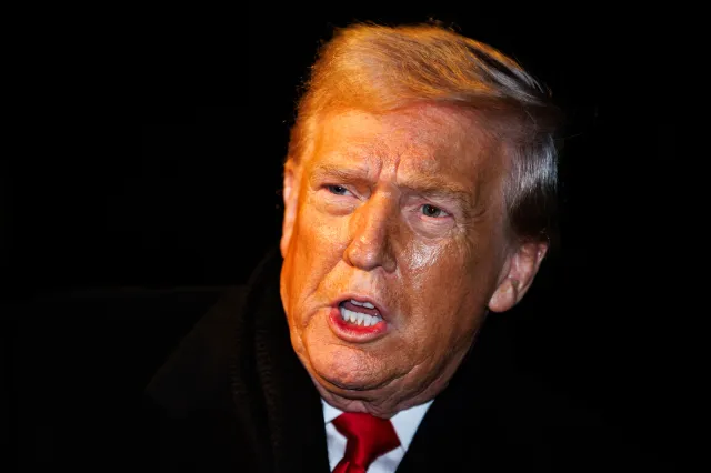 Trump makes a brief statement to reporters before departing from the South Lawn of the White House in Marine One on January 20, 2026 in Washington, DC.