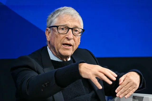 Microsoft co-founder and US philanthropist Bill Gates gestures as he speaks during the World Economic Forum (WEF) annual meeting in Davos on January 21, 2026. The World Economic Forum takes place in Davos from January 19 to January 23, 2026.