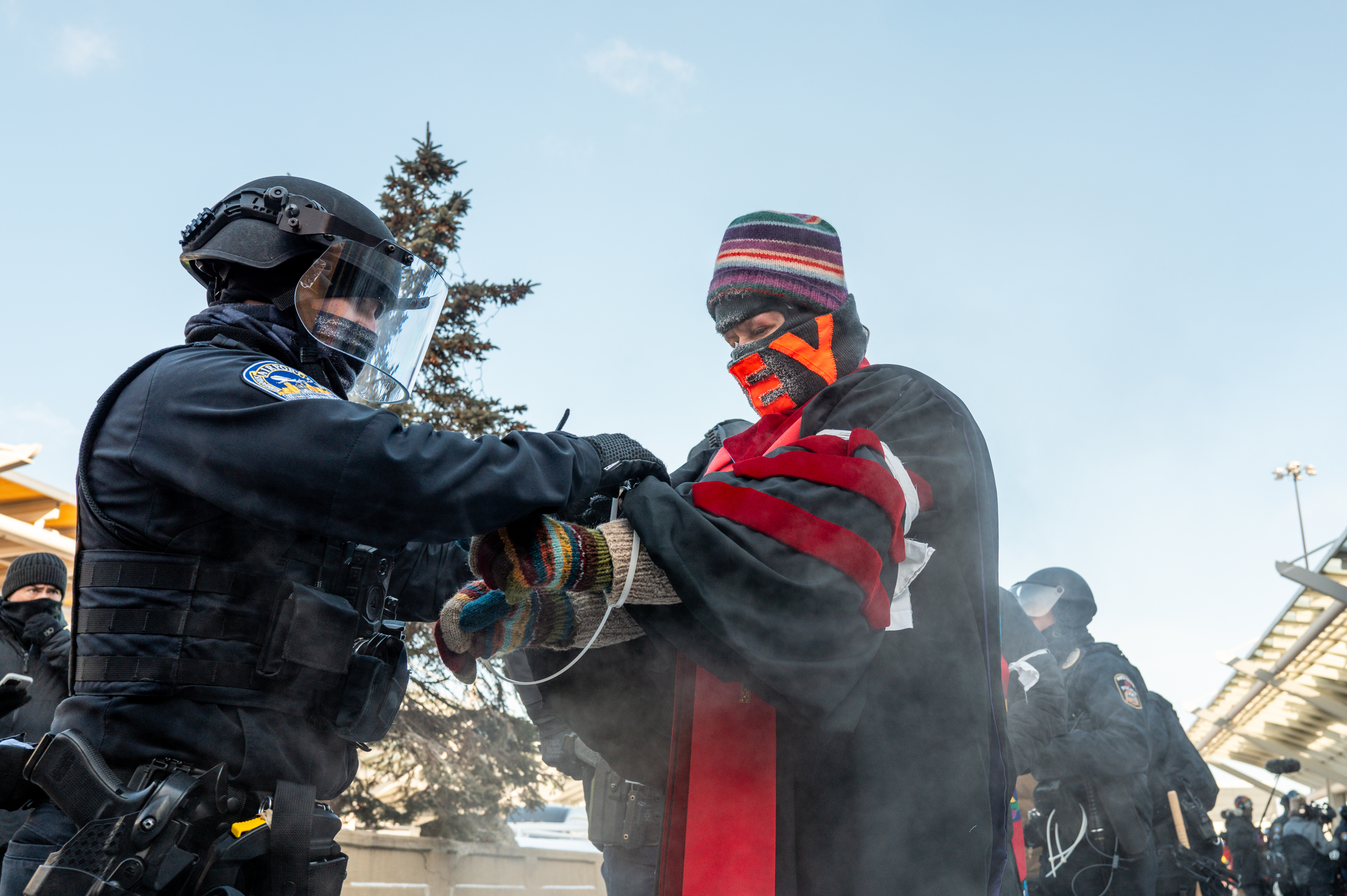 About 100 Clergy Arrested at Minnesota Airport in Anti-ICE Protest