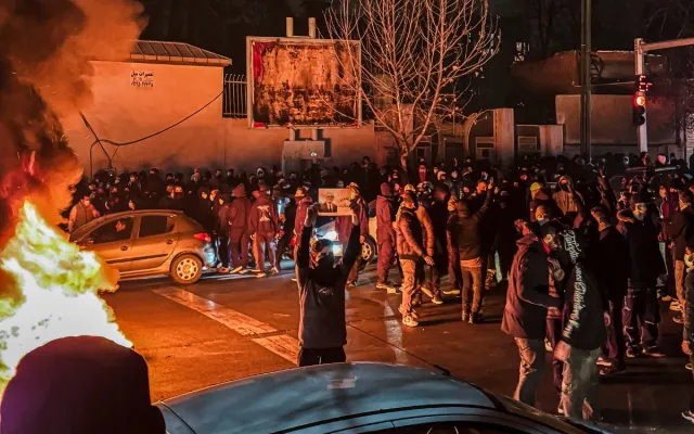 Iranians gather while blocking a street during a protest in Tehran, Iran on January 9, 2026. The nationwide protests started in Tehran's Grand Bazaar against the failing economic policies in late December, which spread to universities and other cities, and included economic slogans, to political and anti-government ones.