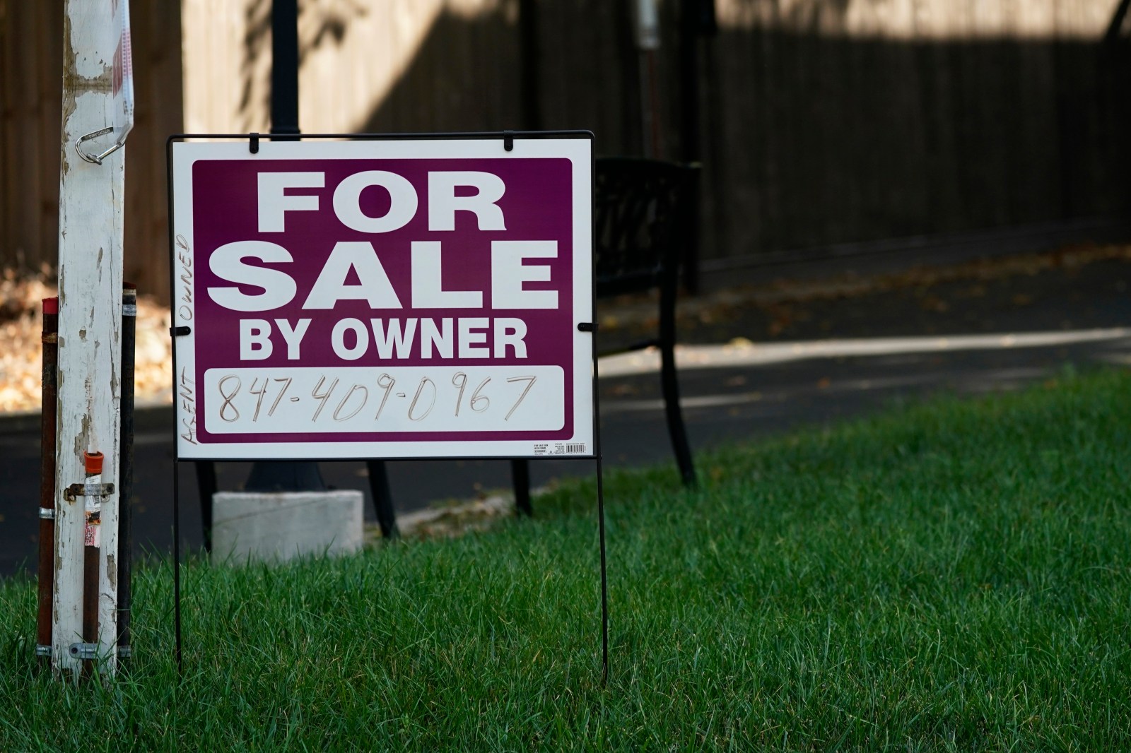 For sale by owner sign is displayed in Northbrook, Ill., Wednesday, on September 21, 2022.