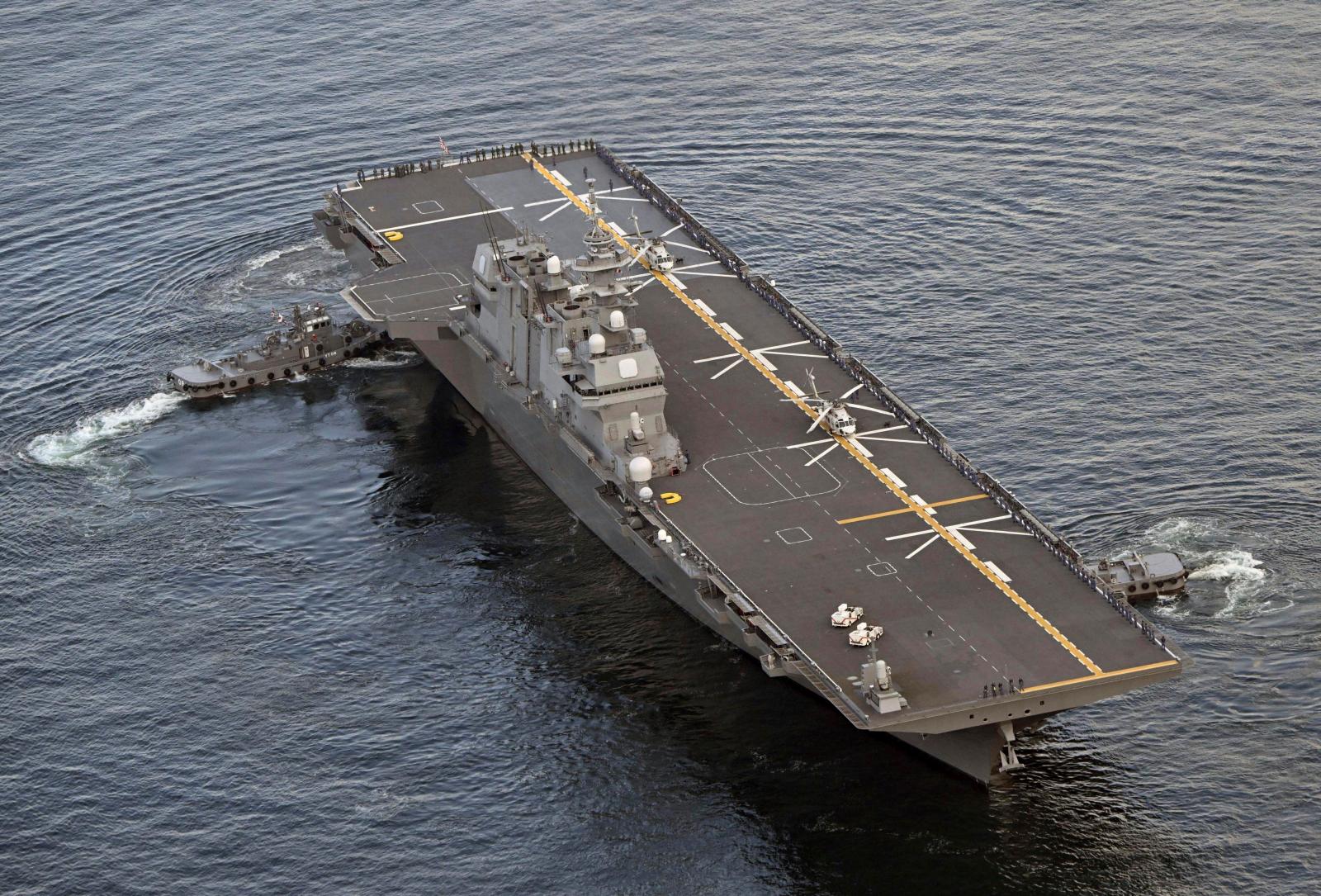 File photo taken from a Kyodo News helicopter on Sept. 17, 2024, shows the Japan Maritime Self-Defense Force destroyer Kaga departing the MSDF’s Kure base in the Hiroshima Prefecture city of Kure, western Japan.