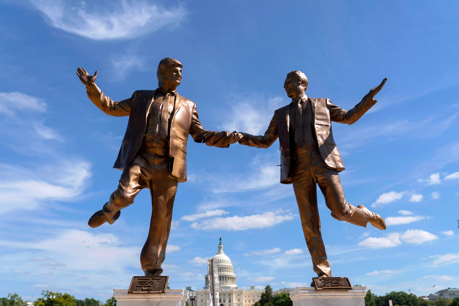 An art installation representing President Donald Trump and Jeffrey Epstein holding hands stands on the National Mall near the Capitol, October 3, 2025, in Washington DC.
