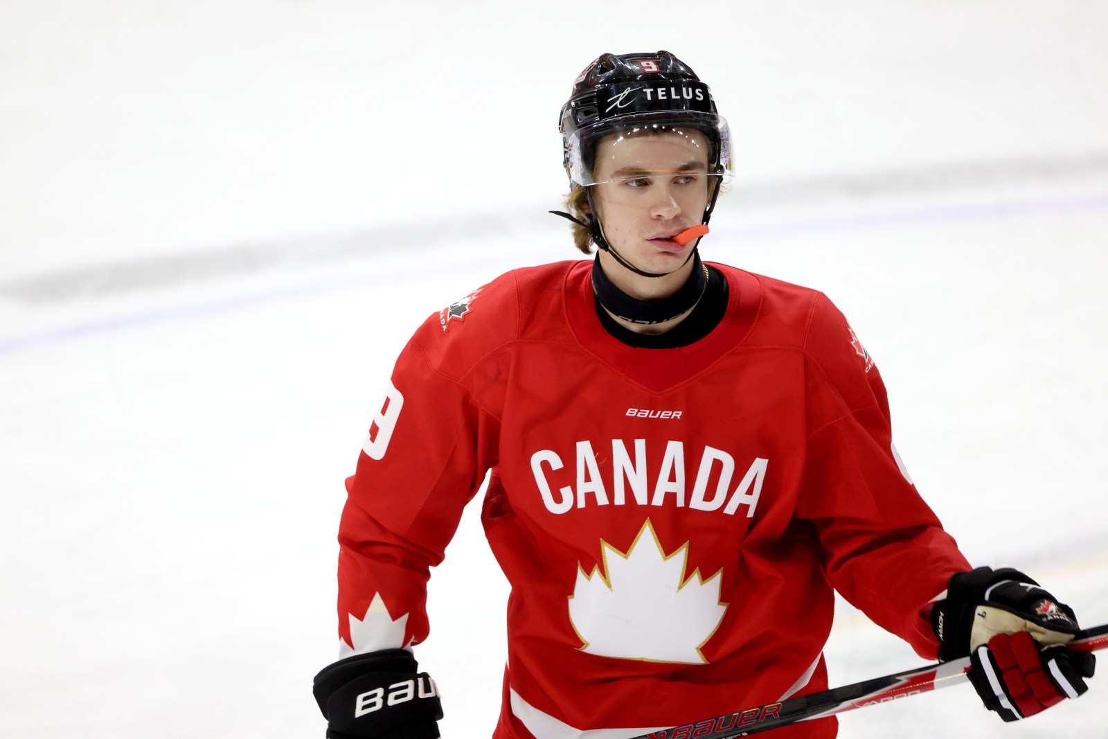 Canada forward Gavin McKenna (9) looks on during the second period of a IIHF World Junior Hockey Championship pre-tournament game against Sweden in London, Ontario, Saturday, Dec. 20, 2025. (Nicole Osborne/The Canadian Press via AP)
