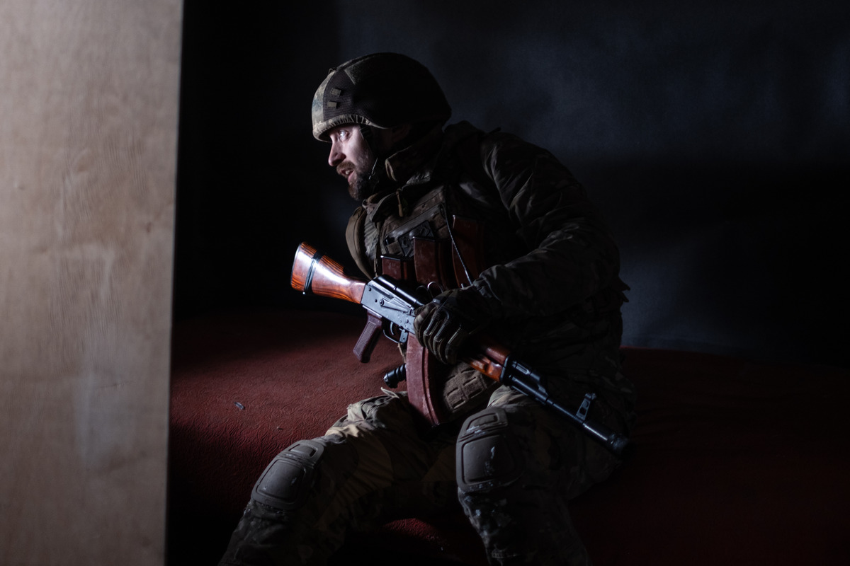 In this photo provided by Ukraine’s 93rd Kholodnyi Yar Separate Mechanized Brigade press service, a soldier looks out of a shelter near Kostyantynivka, in the Donetsk region, Ukraine, Tuesday, Dec. 30, 2025.