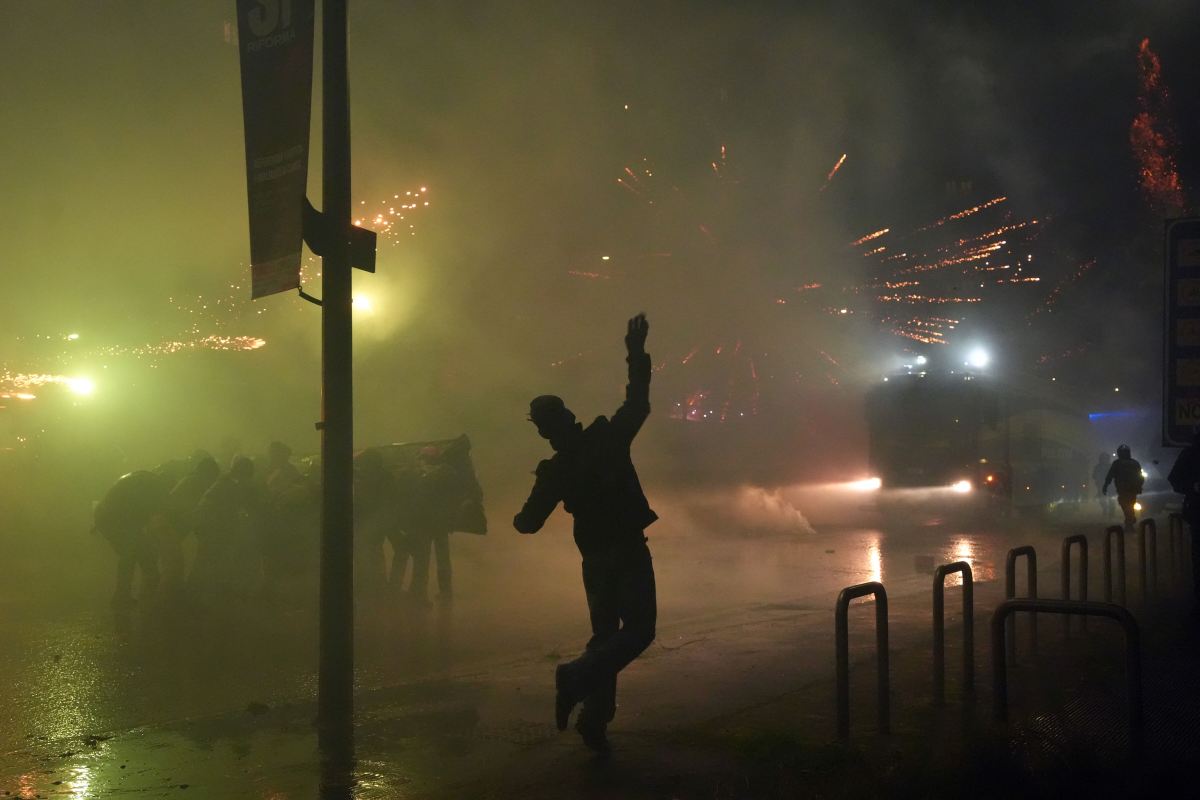 In Photos: Protesters Clash With Police Near Milan Winter Olympics Site