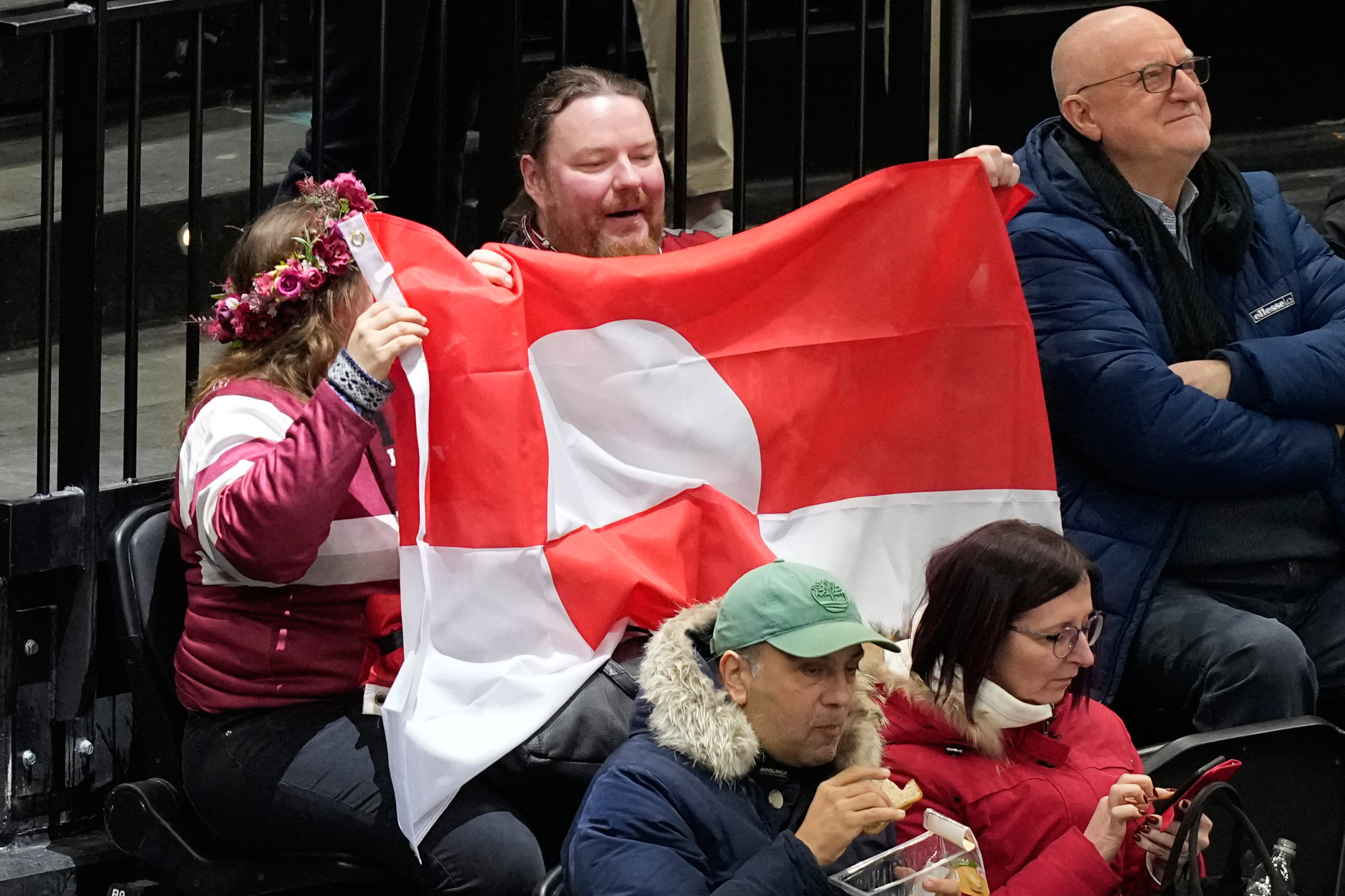 Fans Show Support for Greenland at Winter Olympics Hockey Match