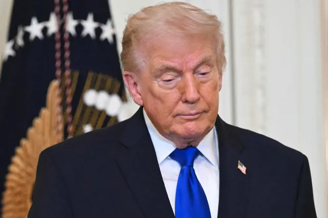US President Donald Trump looks on during the Angel Families Remembrance Ceremony in the East Room of the White House in Washington, DC, on February 23, 2026.