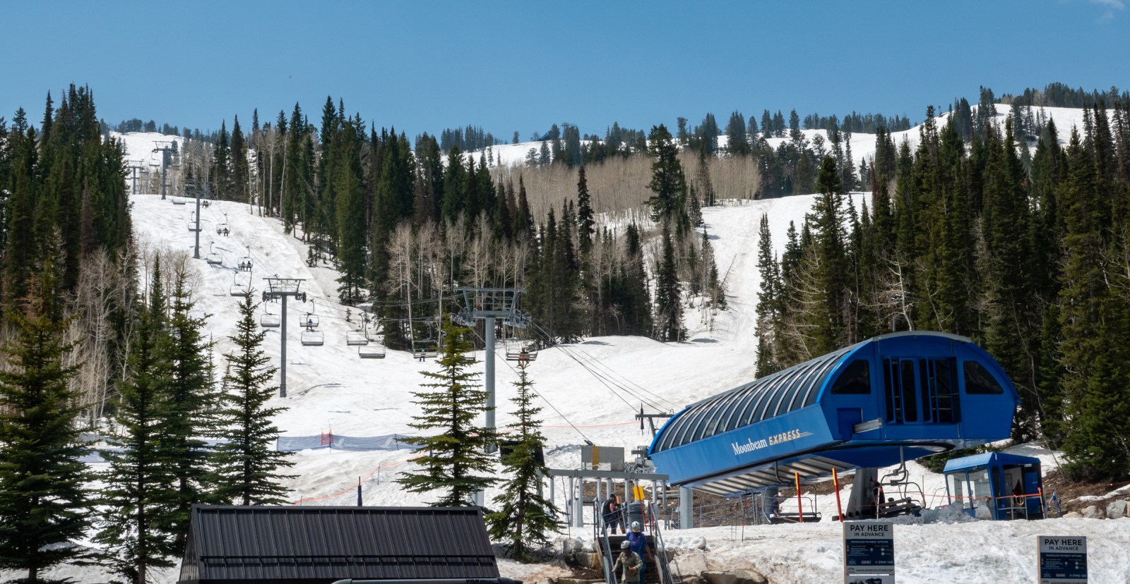 Solitude, Utah, USA- May 19, 2023: Skiers and snowboarders enjoying a warm late spring day at Solitude ski resort. Big Cottonwood Canyon, Utah.