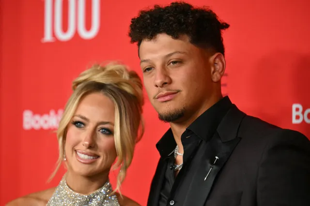 US professional football player Patrick Mahomes (R) and wife US former soccer player Brittany Mahomes.