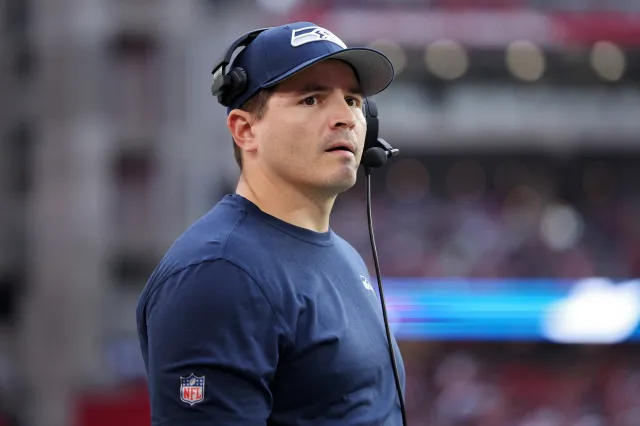 Head coach Mike Macdonald of the Seattle Seahawks looks on in the second quarter against the Arizona Cardinals at State Farm Stadium on December 08, 2024 in Glendale, Arizona.