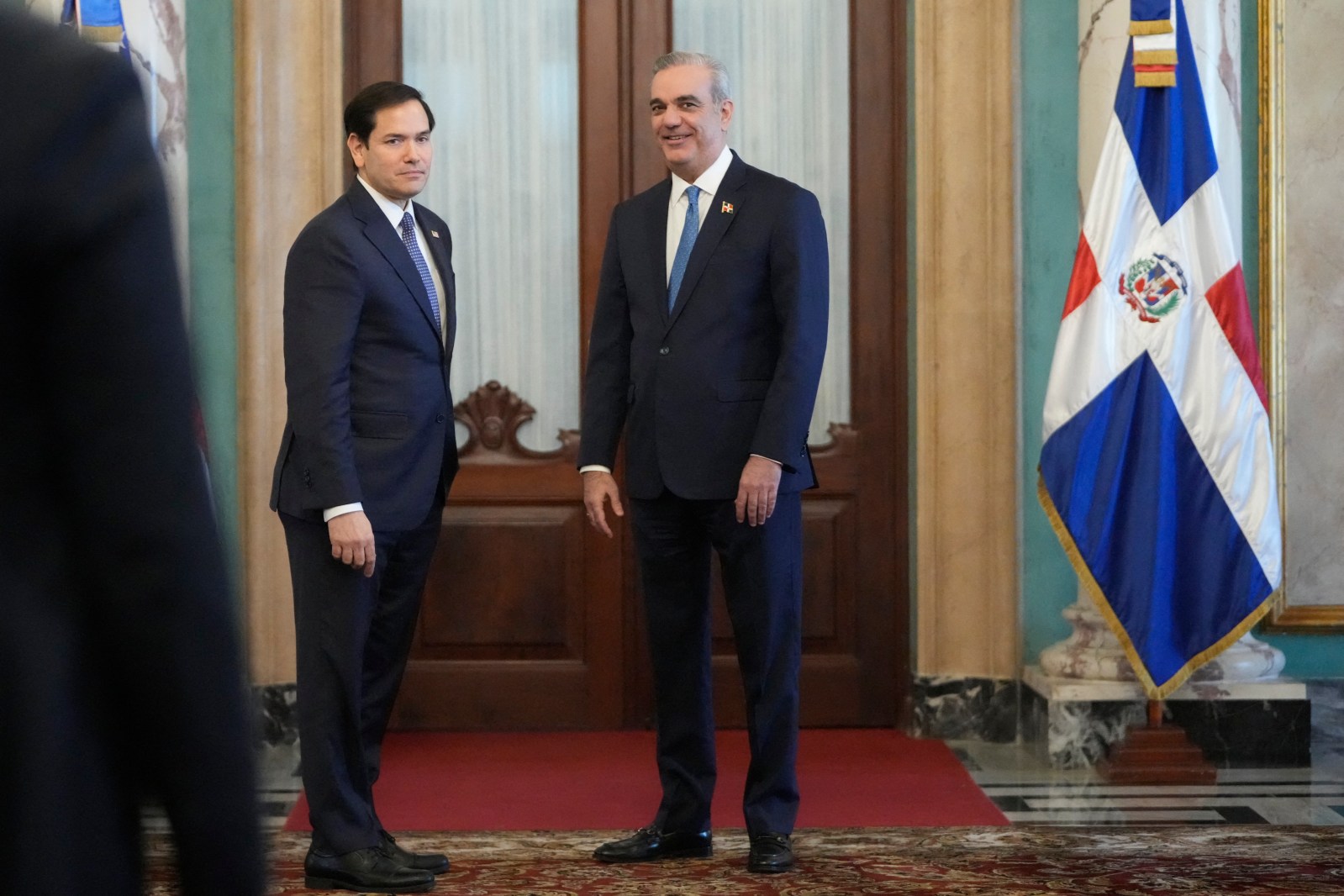 US Secretary of State Marco Rubio (L) stands with Dominican Republic President Luis Abinader at the end of their joint news conference at the National Palace in Santo Domingo, on February 6, 2025. (Photo by Mark Schiefelbein / POOL / AFP) (Photo by MARK SCHIEFELBEIN/POOL/AFP via Getty Images)
