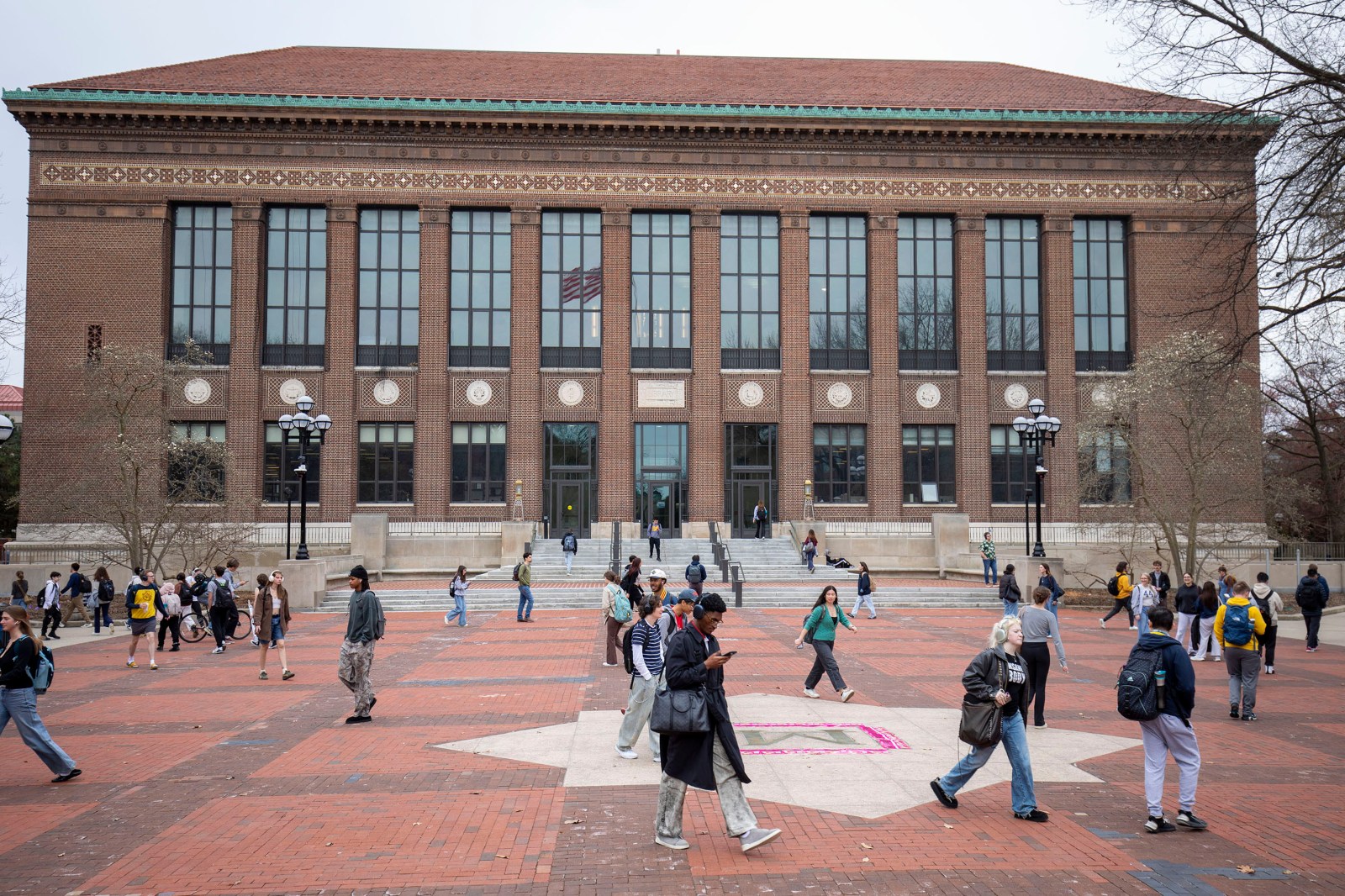 University of Michigan students walk on the UM campus on April 3, 2025 in Ann Arbor, Michigan.
