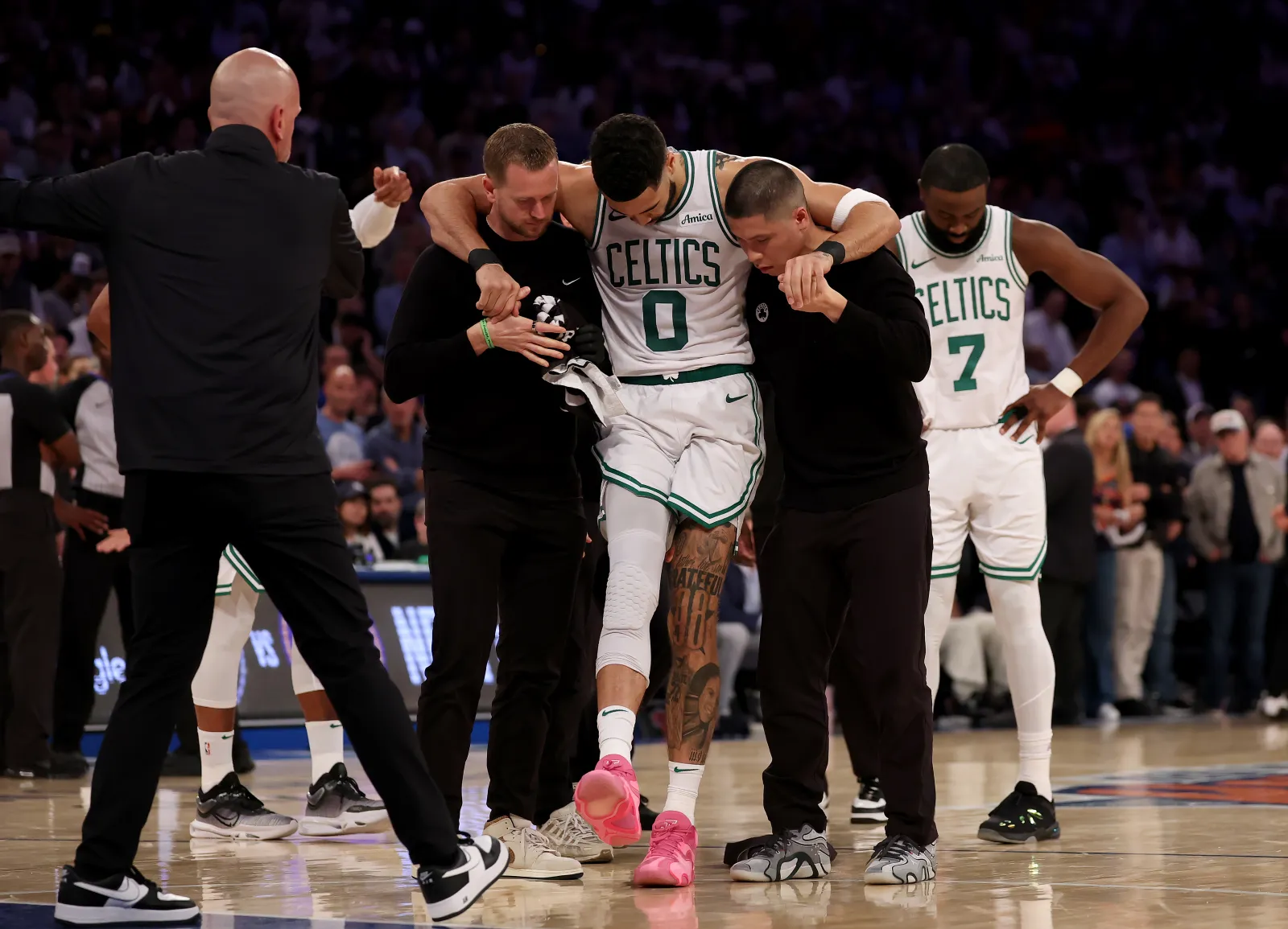 Boston Celtics star Jayson Tatum is helped off the court after injury