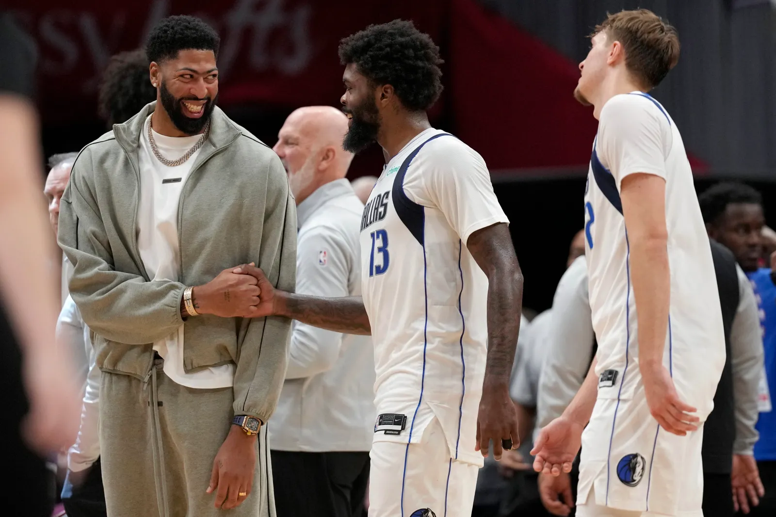 Anthony Davis with former Dallas Mavericks teammates Naji Marshall and Cooper Flagg