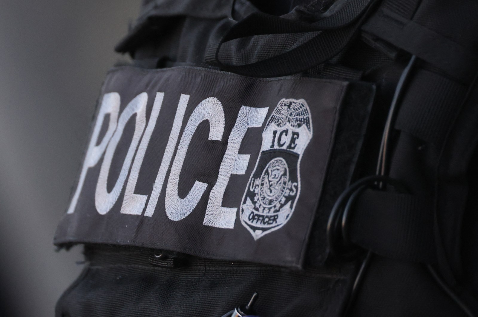 Close up detail of a law enforcement agent is seen during a “National Shutdown” protest against US Immigration and Customs Enforcement in Los Angeles on January 30, 2026. Donald Trump’s border chief said January 29, 2026 that some federal agents could be withdrawn from Minneapolis, the northern US city that has become the flashpoint for the president’s immigration crackdown. The Trump administration, facing a public backlash over the shooting deaths of two Americans by federal agents in Minneapolis, also eased immigration operations in the northeastern state of Maine. (Photo by Patrick T. Fallon / AFP via Getty Images)
