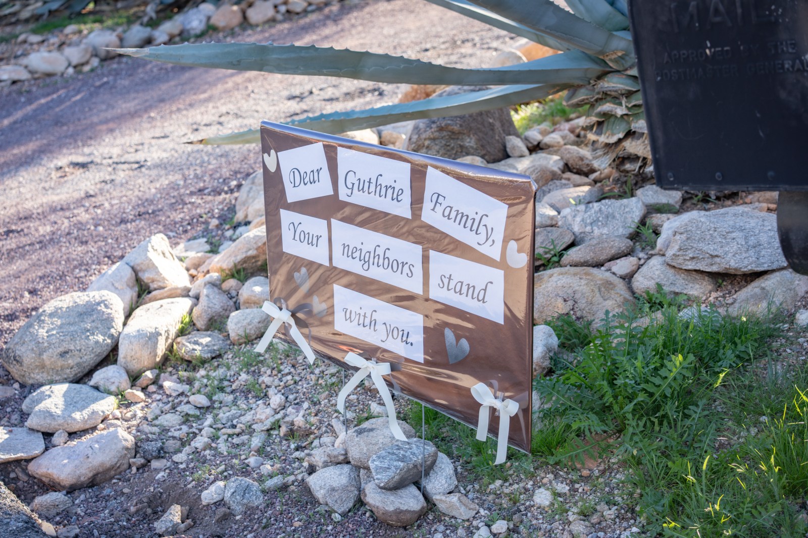 A sign is posted at the house of Nancy Guthrie, NBC host Savannah Guthrie’s mother, on February 3, 2026 in Catalina, Arizona. 
