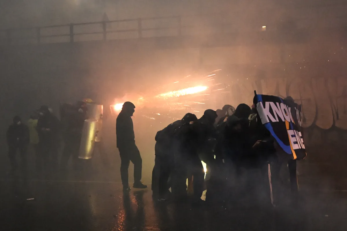 In Photos: Protesters Clash With Police Near Milan Winter Olympics Site ...