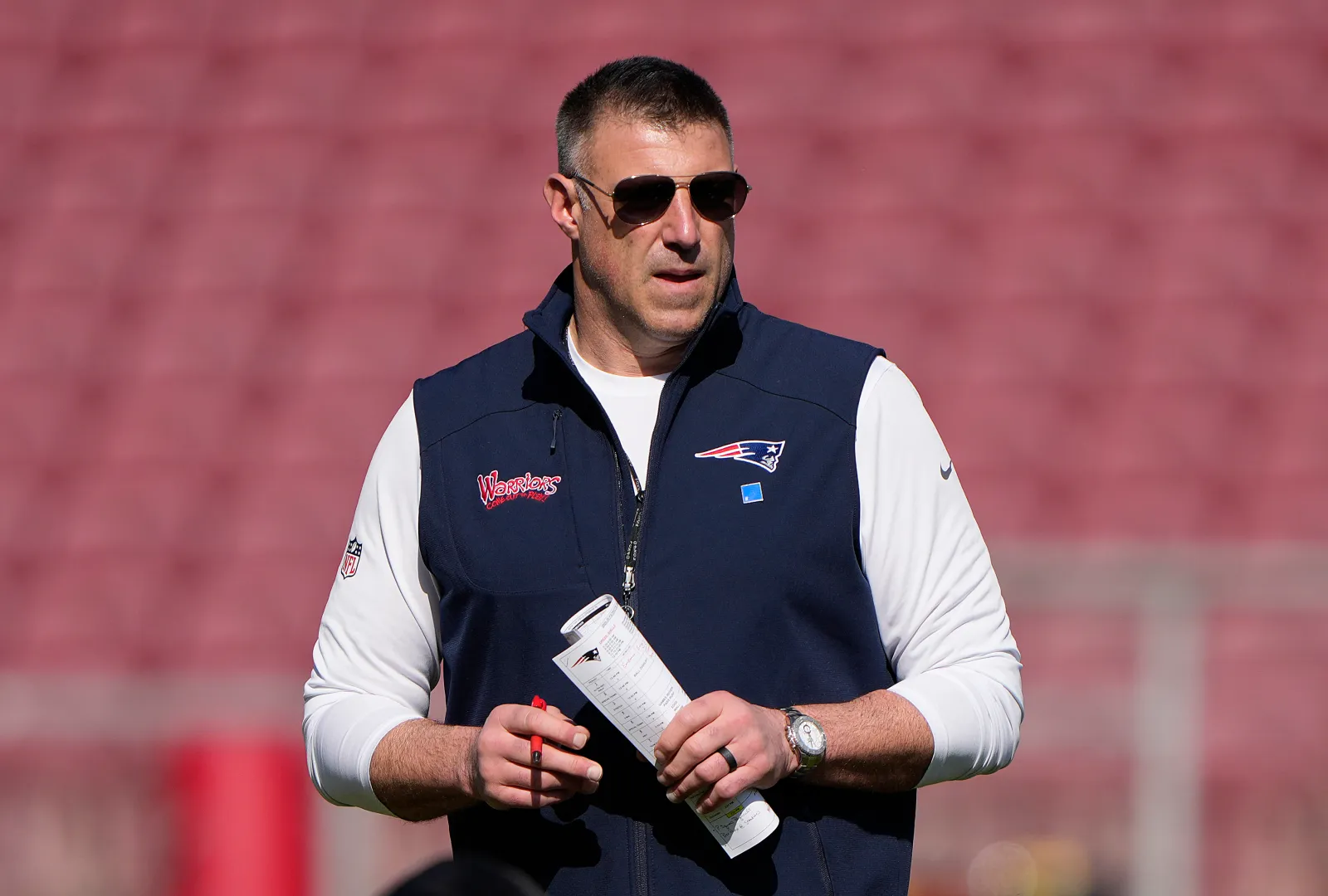 STANFORD, CALIFORNIA - FEBRUARY 06: Head coach Mike Vrabel of the New England Patriots looks on during drills during practice prior to Super Bowl LX at Stanford Stadium on February 06, 2026 in Stanford, California. (Photo by Thearon W. Henderson/Getty Images)