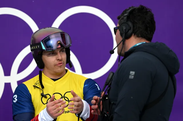 LIVIGNO, ITALY - FEBRUARY 12: Nathan Pare of Team United States speaks to an official after being ranked as last following a review in the Men's Snowboard Cross Quarterfinals on day six of the Milano Cortina 2026 Winter Olympic games at Livigno Snow Park on February 12, 2026 in Livigno, Italy. (Photo by Hannah Peters/Getty Images)