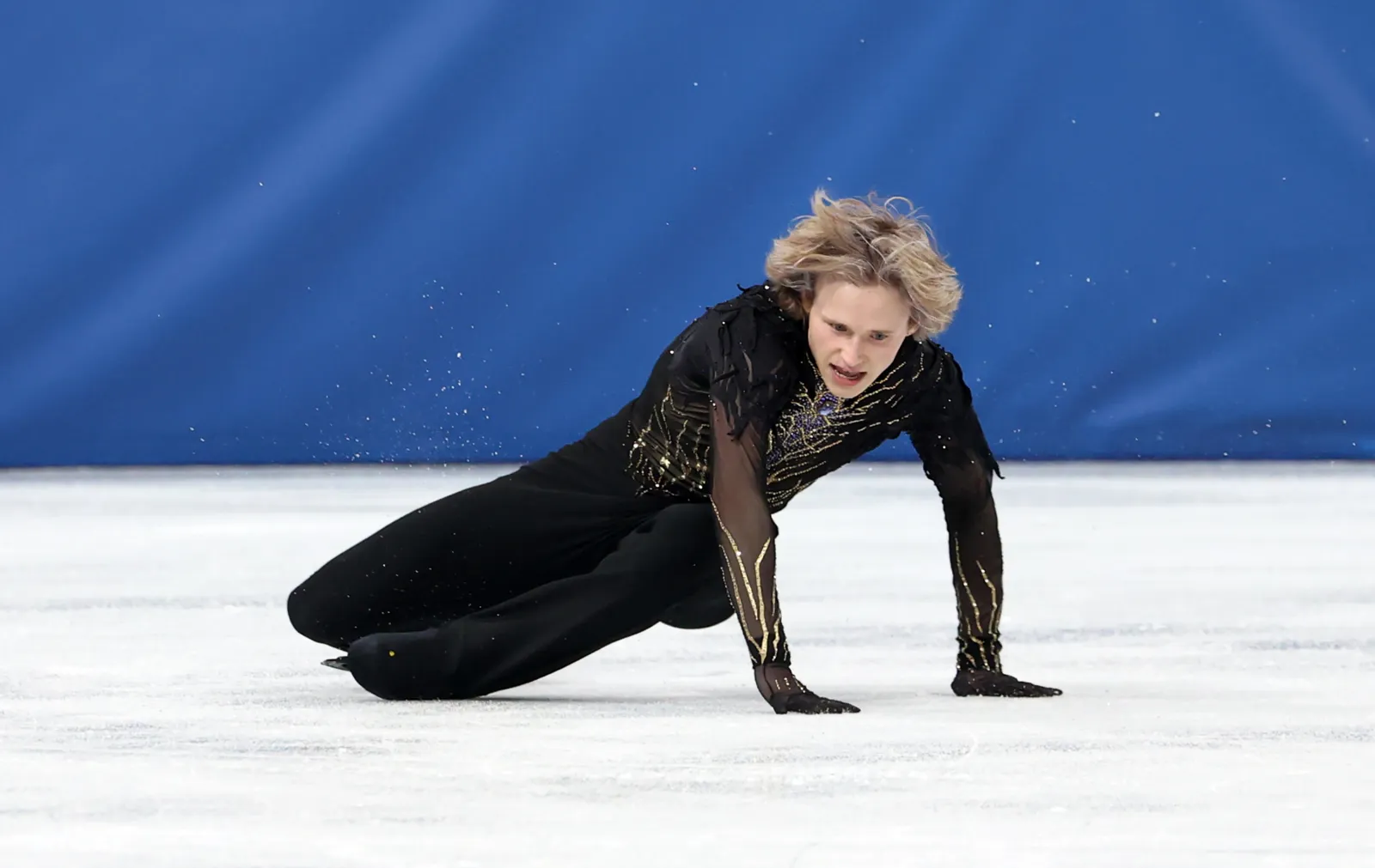 Team USA skater Ilia Malinin falls on the ice at Winter Olympics in Milano Cortina Italy