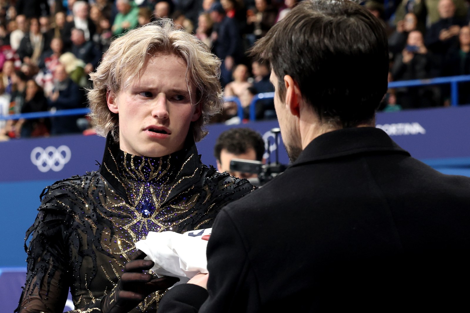 Ilia Malinin of Team United States looks dejected after competing in the Men Single Skating on day seven of the Milano Cortina 2026 Winter Olympic games at Milano Ice Skating Arena on February 13, 2026 in Milan, Italy. (Photo by Jamie Squire/Getty Images)