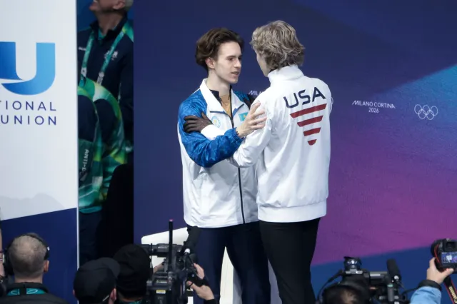 MILAN, ITALY - FEBRUARY 13: Ilia Malinin of Team United States (right) congratulates the Gold medalist Mikhail Shaidorov of Team Kazakhstan during the Figure Skating Men Single Free Skating event on day seven of the Milano Cortina 2026 Winter Olympic Games at Milano Ice Skating Arena on February 13, 2026 in Milan, Italy. (Photo by Jean Catuffe/Getty Images)