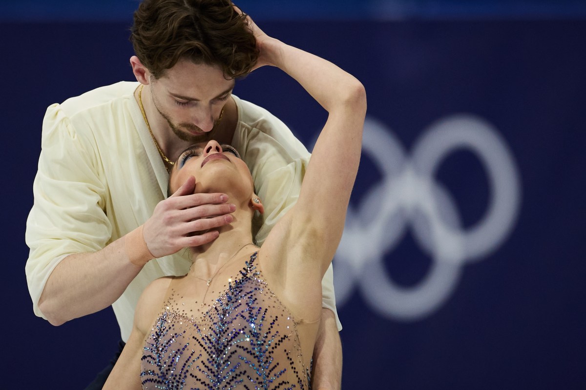 Olympic skating couple broke up but still skated together in Milan