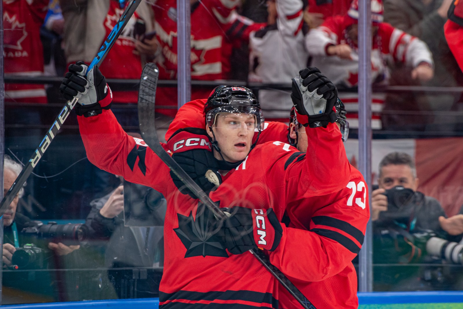 Nathan MacKinnon #29 of Canada celebrates his goal with Sam Reinhart #13 of Canada during the Men’s Semifinal match between Canada and Finland on day fourteen of the Milano Cortina 2026 Winter Olympic games at Milano Santagiulia Ice Hockey Arena on February 20, 2026 in Milan, Italy.