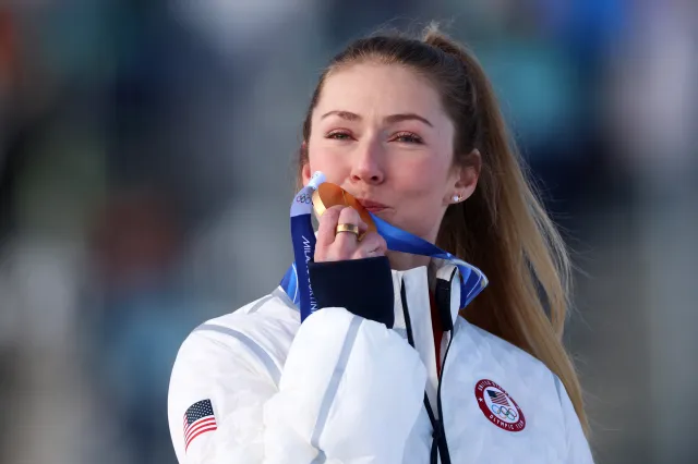 Mikaela Shiffrin celebrates her gold medal win at 2026 Milano Cortina Olympics in Italy